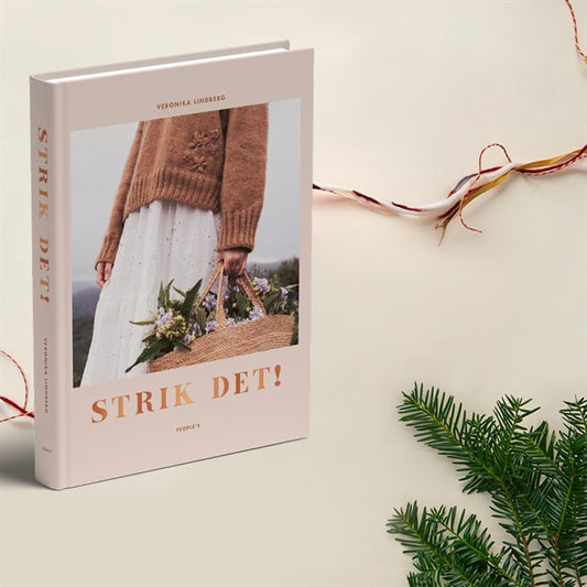 Bogen Strik det! & 26 nr. af hendes verden